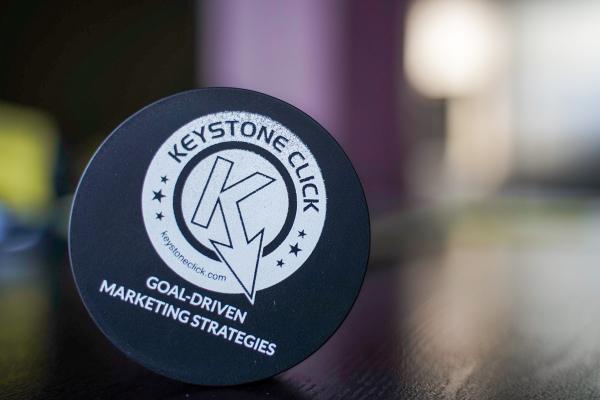 Keystone Click branded hockey puck